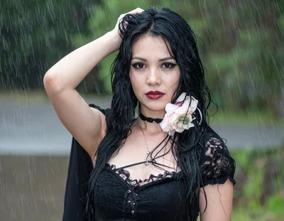 Gothic Woman With Flower In Rain