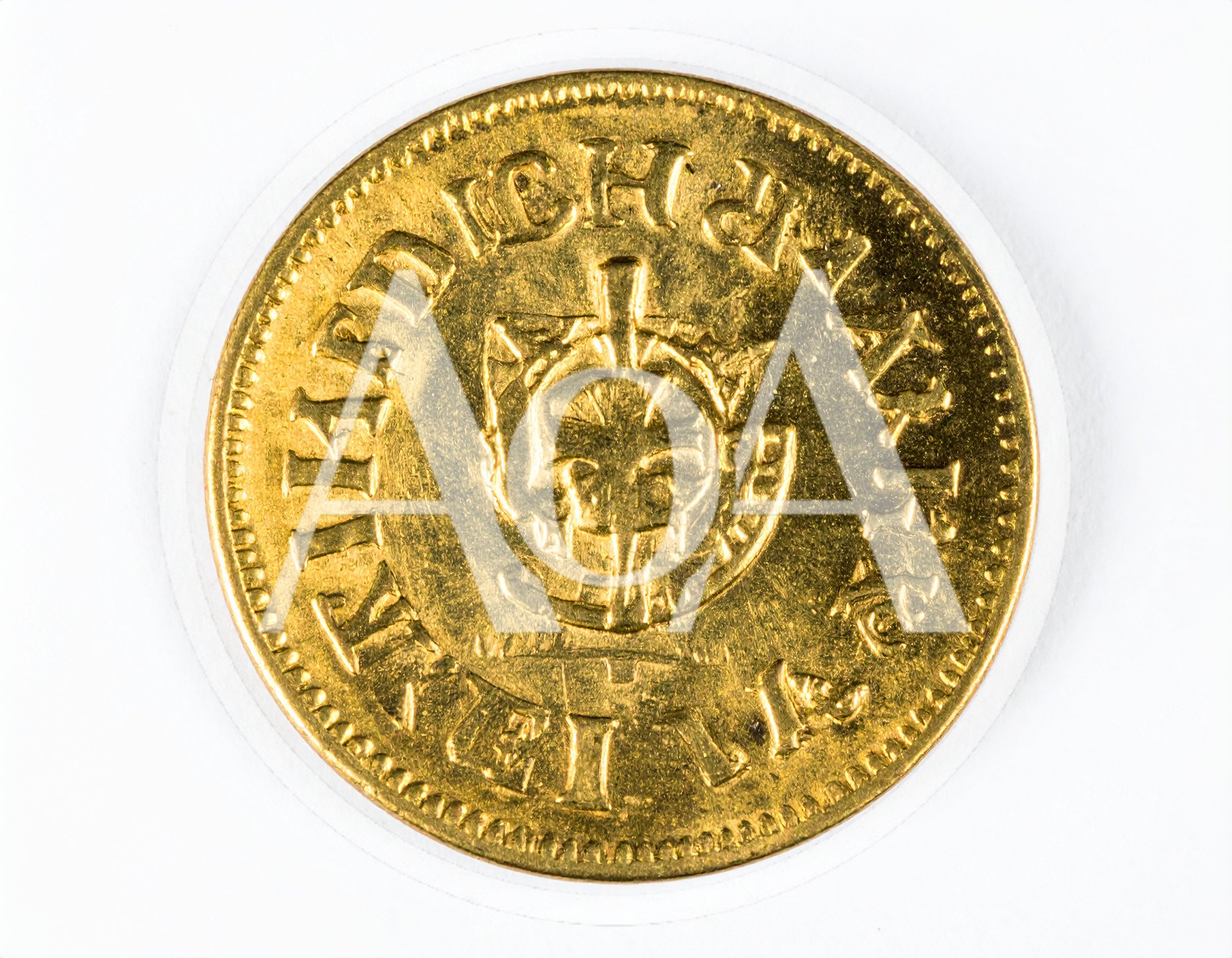Close Up Of An Antique Gold Coin