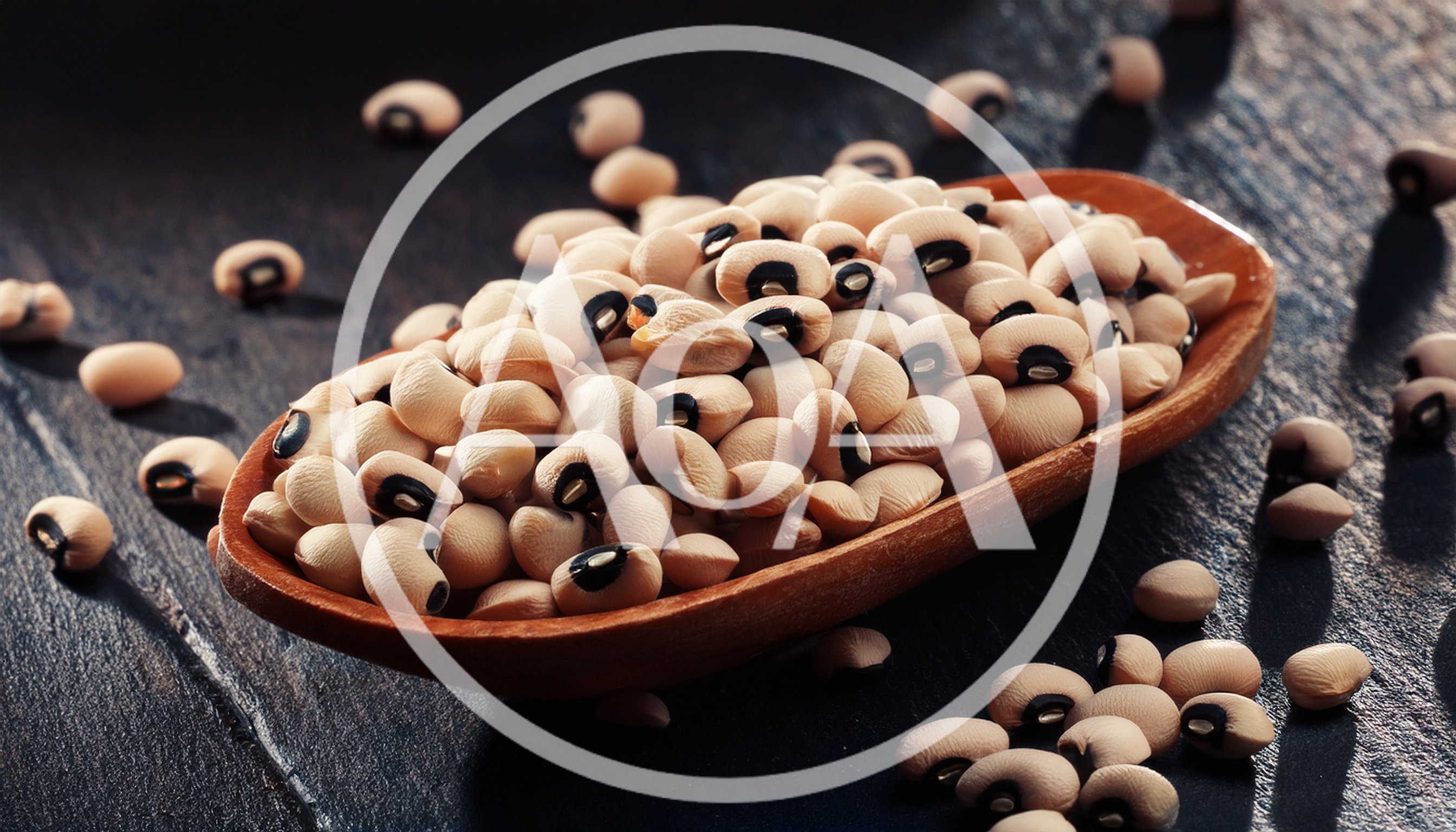 Wooden Spoon Filled With Dried Black Eyed Peas