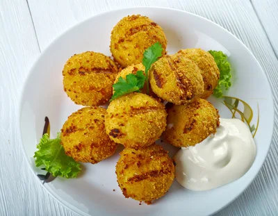 Fried Potato Croquettes Served With Creamy Dipping Sauce