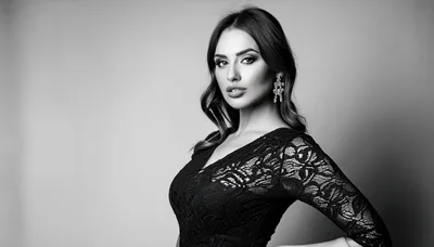 Elegant Woman In Black Lace Dress Posing