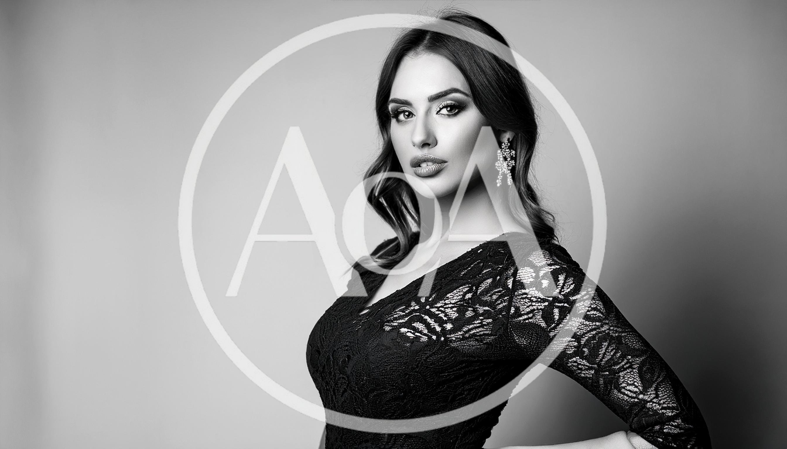 Elegant Woman In Black Lace Dress Posing