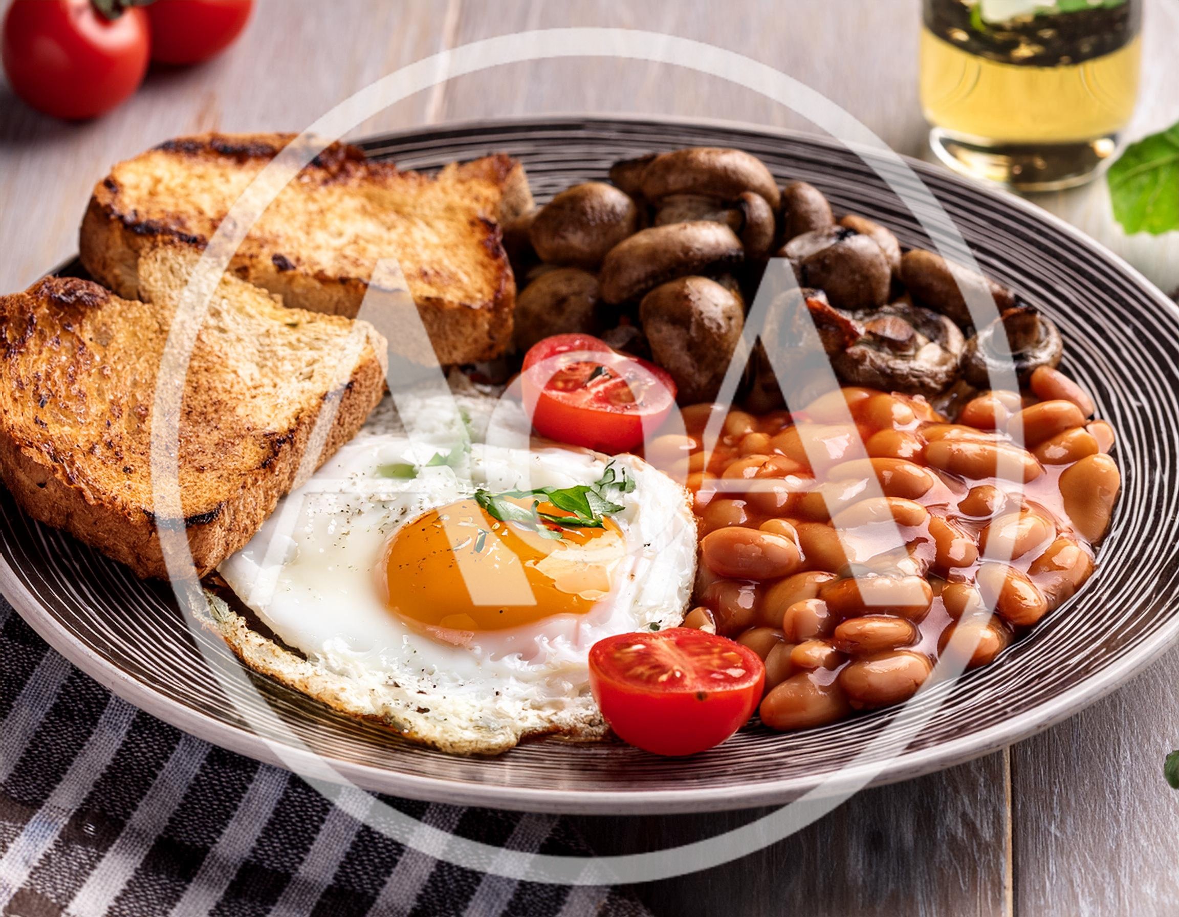 Traditional English Breakfast Plate With Fried Egg And Beans