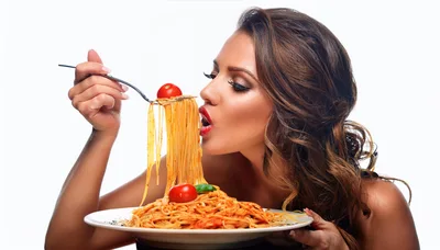 Beautiful Woman Eating Spaghetti With Tomato On White Background