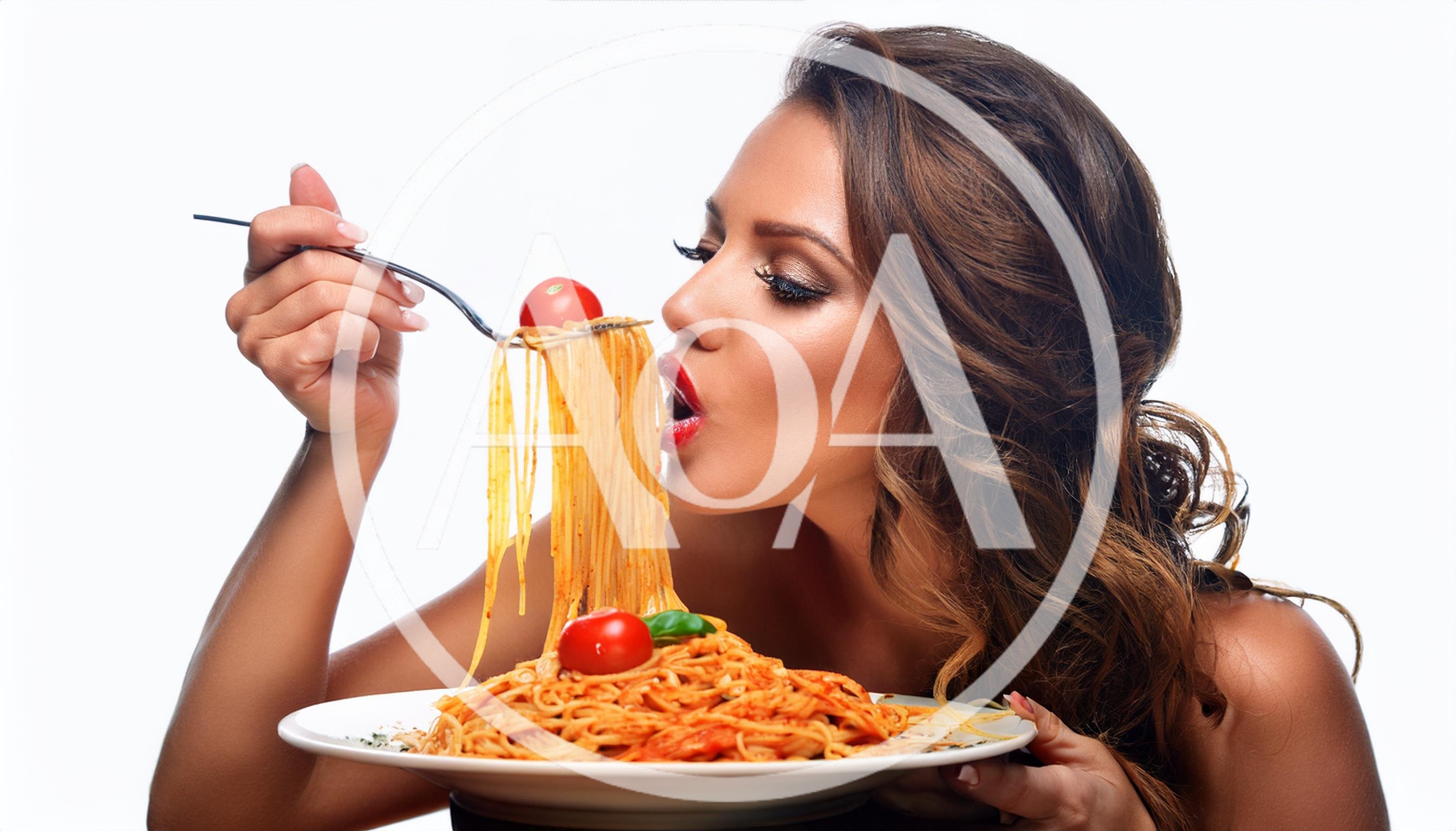 Beautiful Woman Eating Spaghetti With Tomato On White Background
