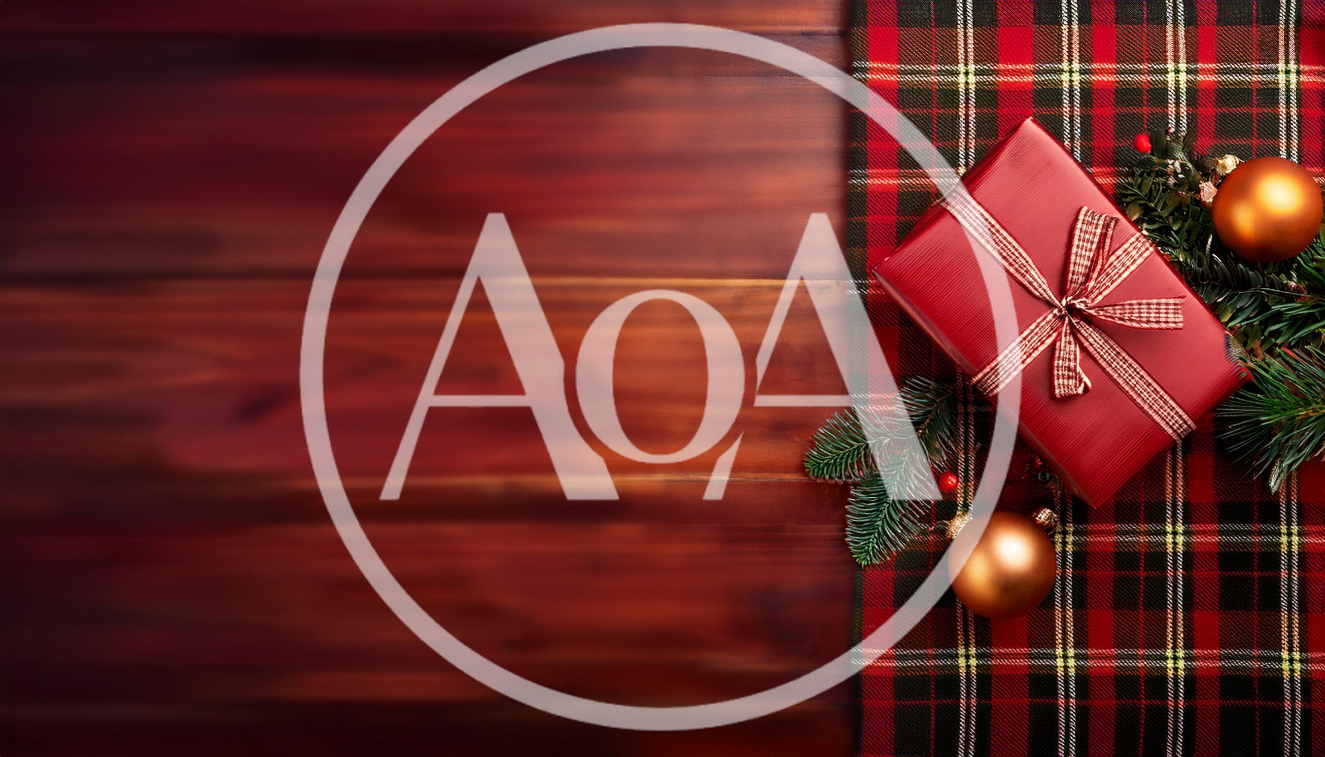 Christmas Gift Box on Plaid Fabric and Wood
