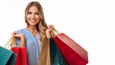 Smiling Young Woman Holding Colorful Shopping Bags