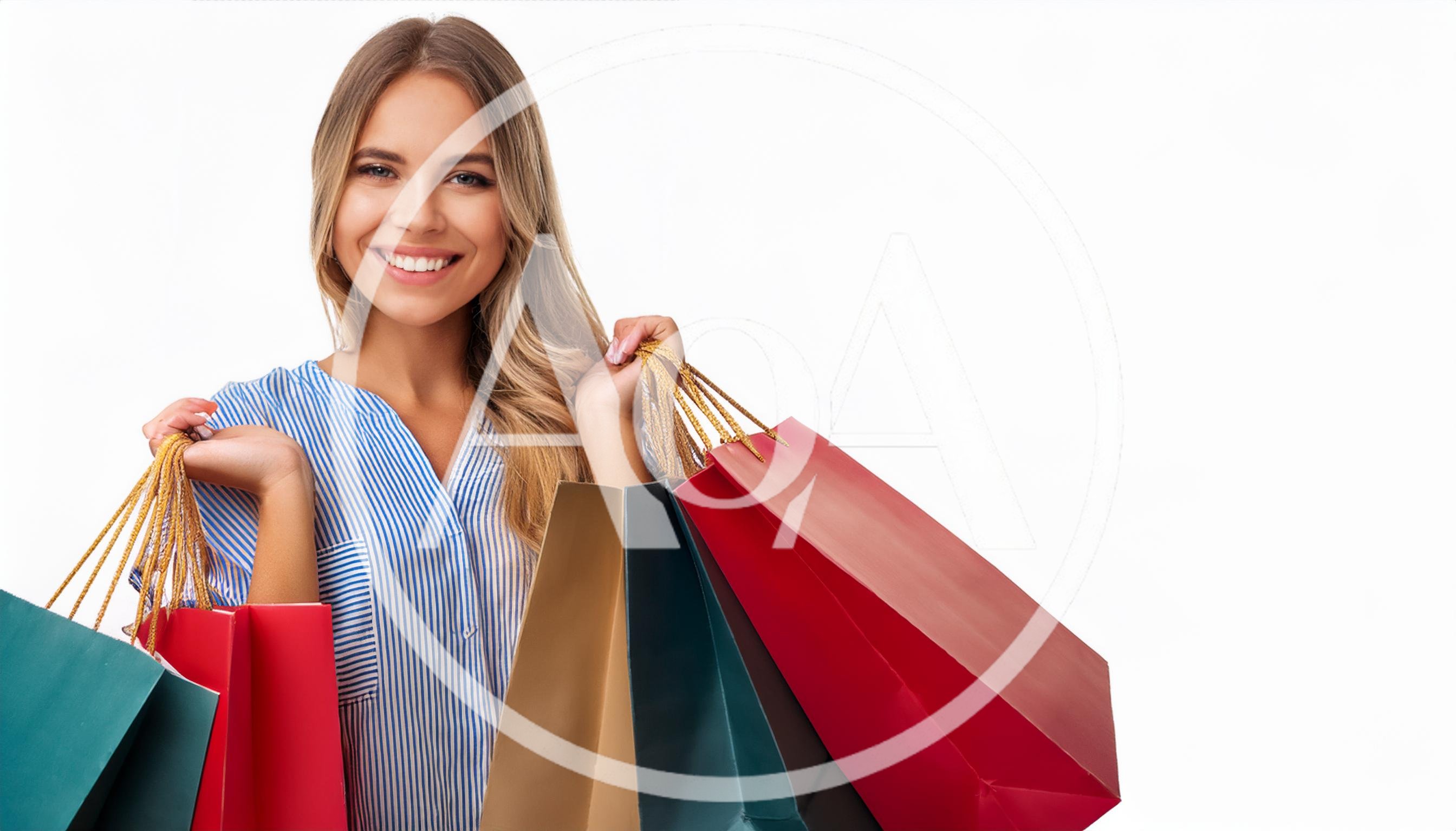 Smiling Young Woman Holding Colorful Shopping Bags