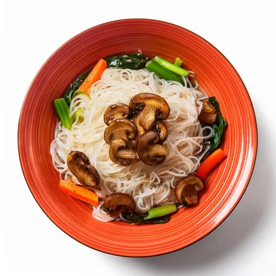 Bowl Of Rice Noodles With Mushrooms And Vegetables