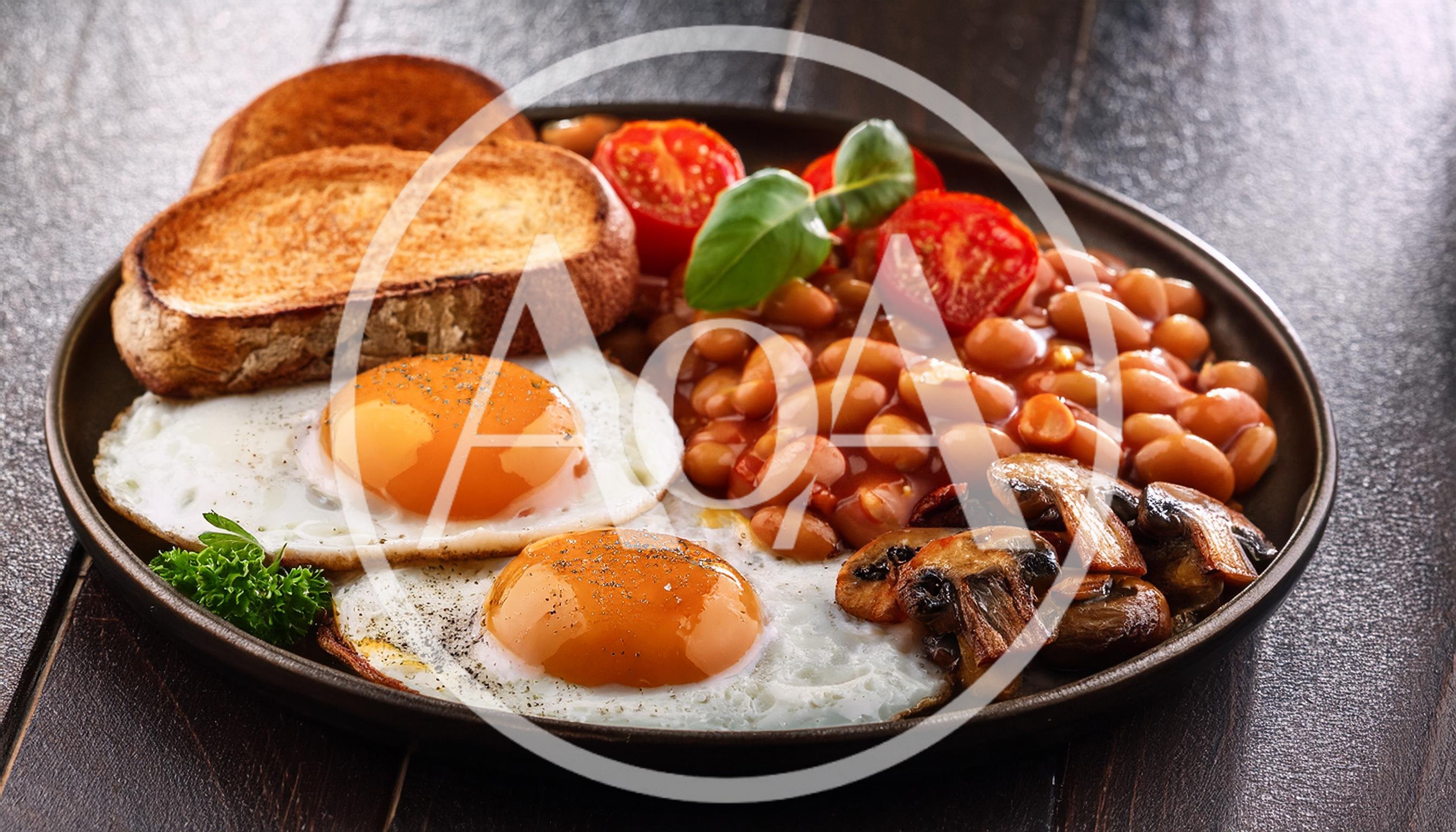 Traditional English Breakfast With Eggs Beans And Toast