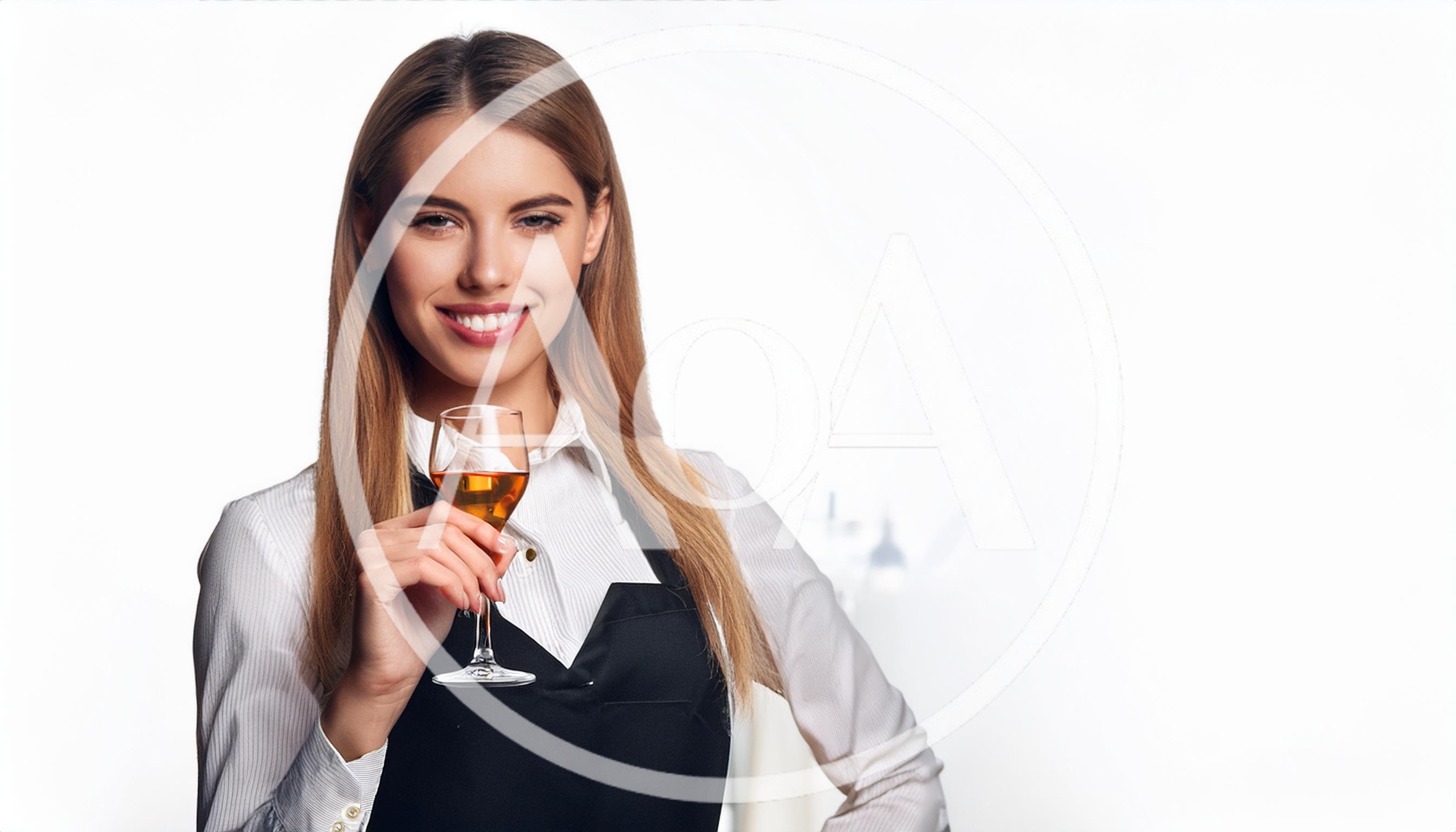 Smiling Female Sommelier Holding A Glass Of Wine