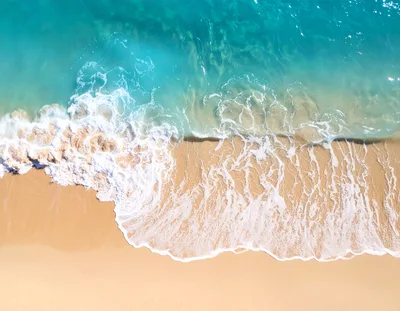 Aerial View Of Tropical Beach Waves