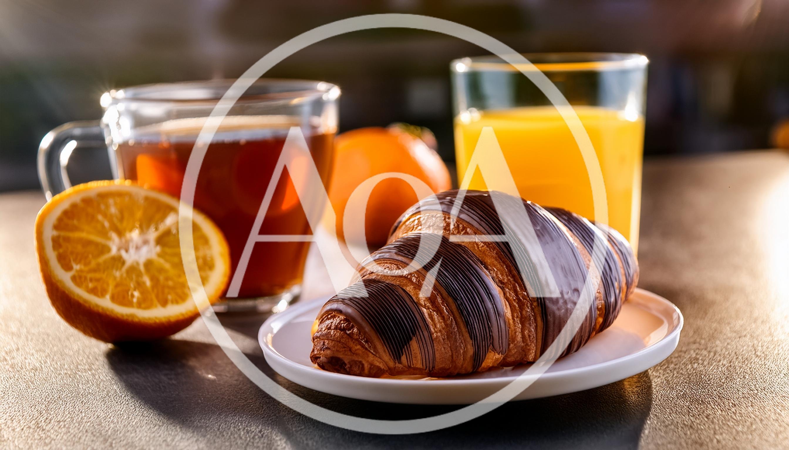 Chocolate Croissant Breakfast With Tea And Orange Juice