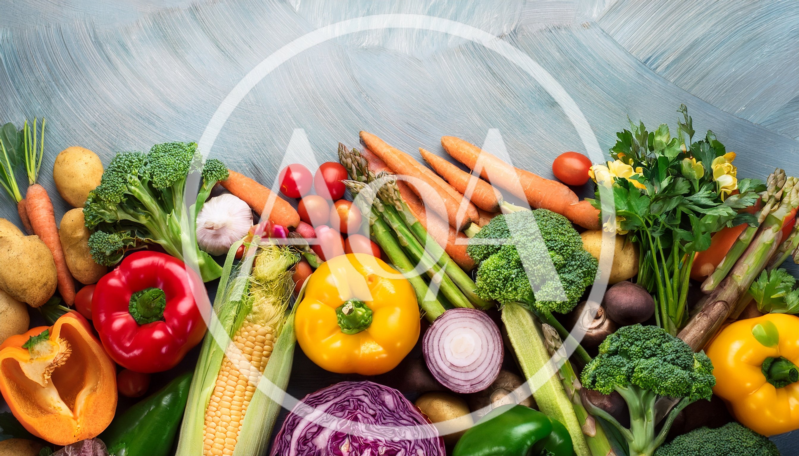 Fresh Assorted Vegetables Arranged On A Blue Surface