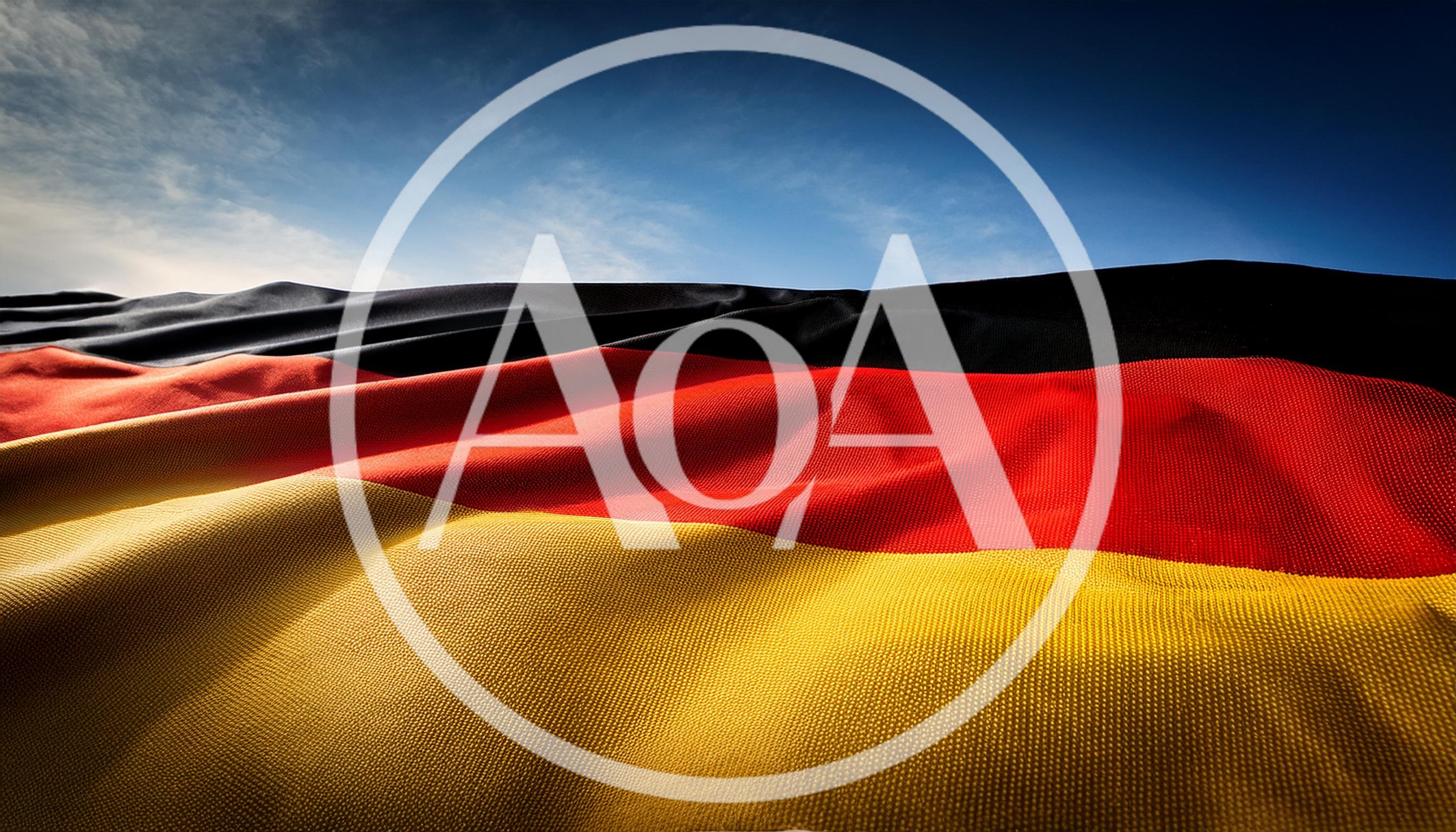 Waving German Flag Against A Clear Blue Sky