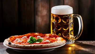 Fresh Pepperoni Pizza And A Glass Of Beer