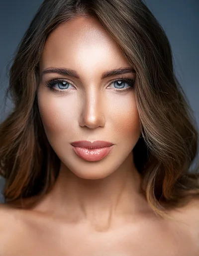 Portrait Of A Beautiful Woman With Blue Eyes