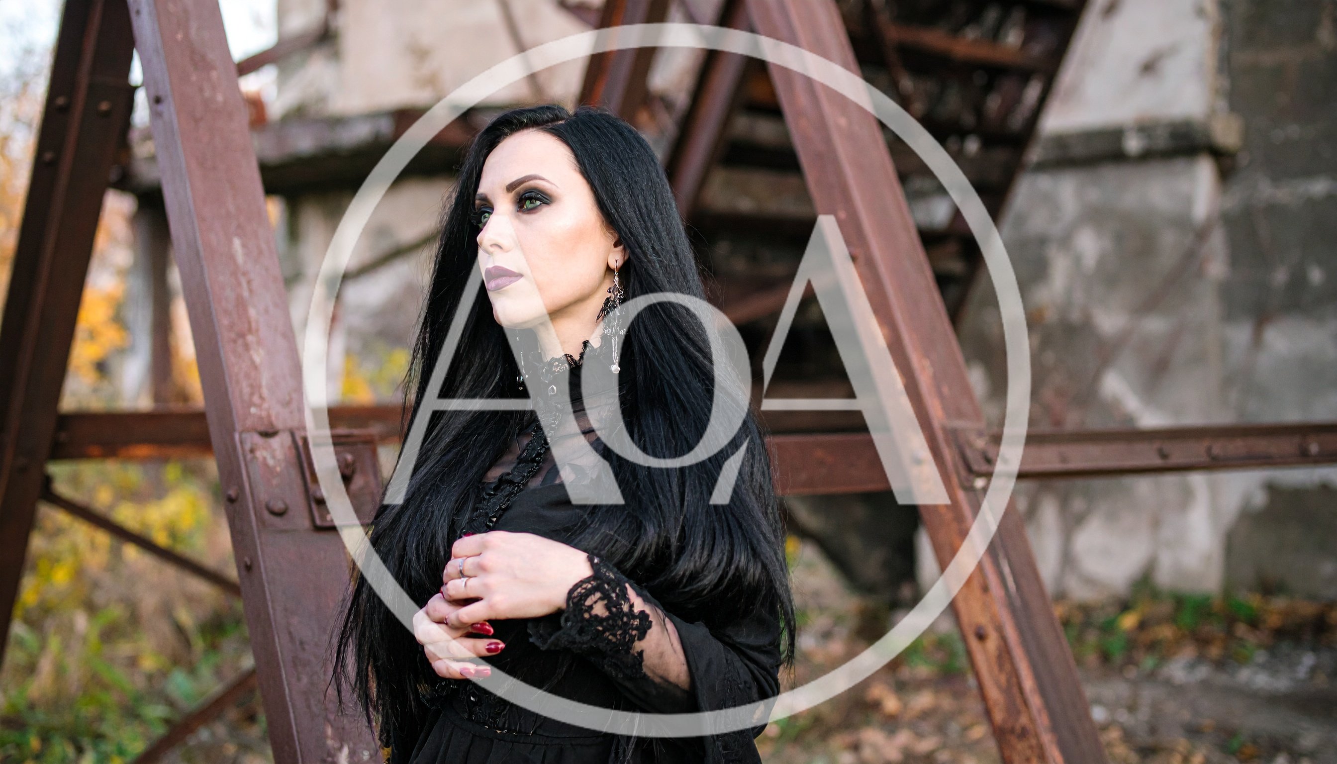 Gothic Woman Standing Near Rusty Industrial Structure