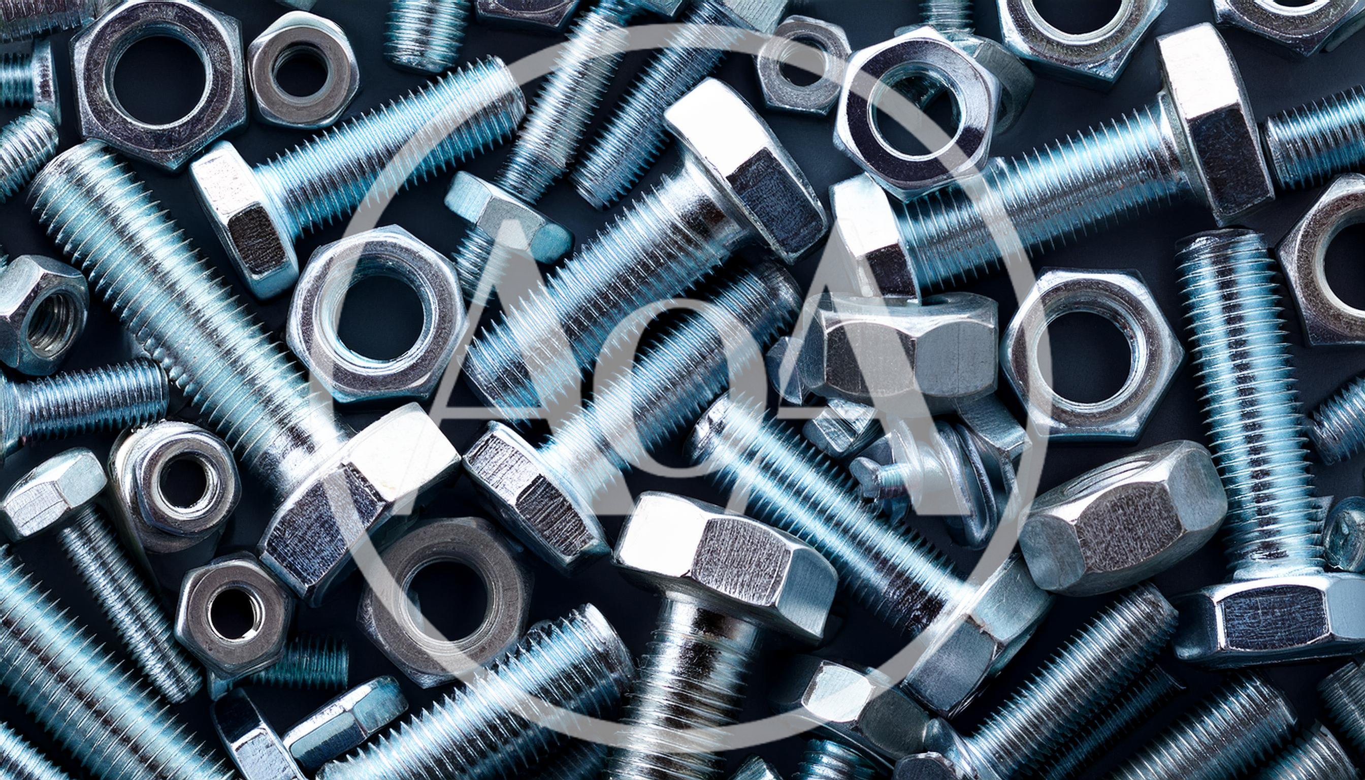 Assorted Metal Bolts and Nuts on Dark Background
