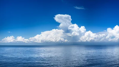 Panoramic View Of Cumulus Clouds Over The Ocean