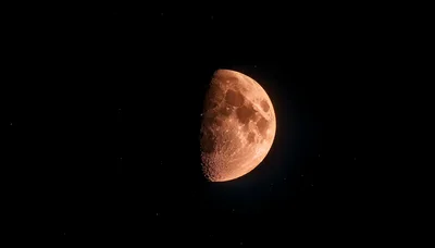 Half Moon Glowing In The Dark Night Sky