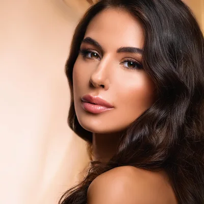 Portrait Of A Beautiful Woman With Wavy Hair