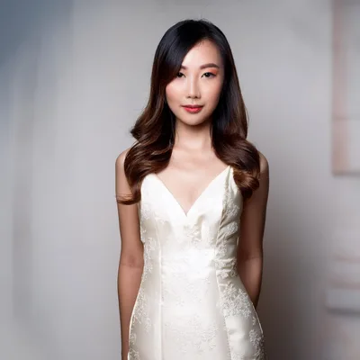 Portrait Of A Young Asian Woman In A Wedding Dress