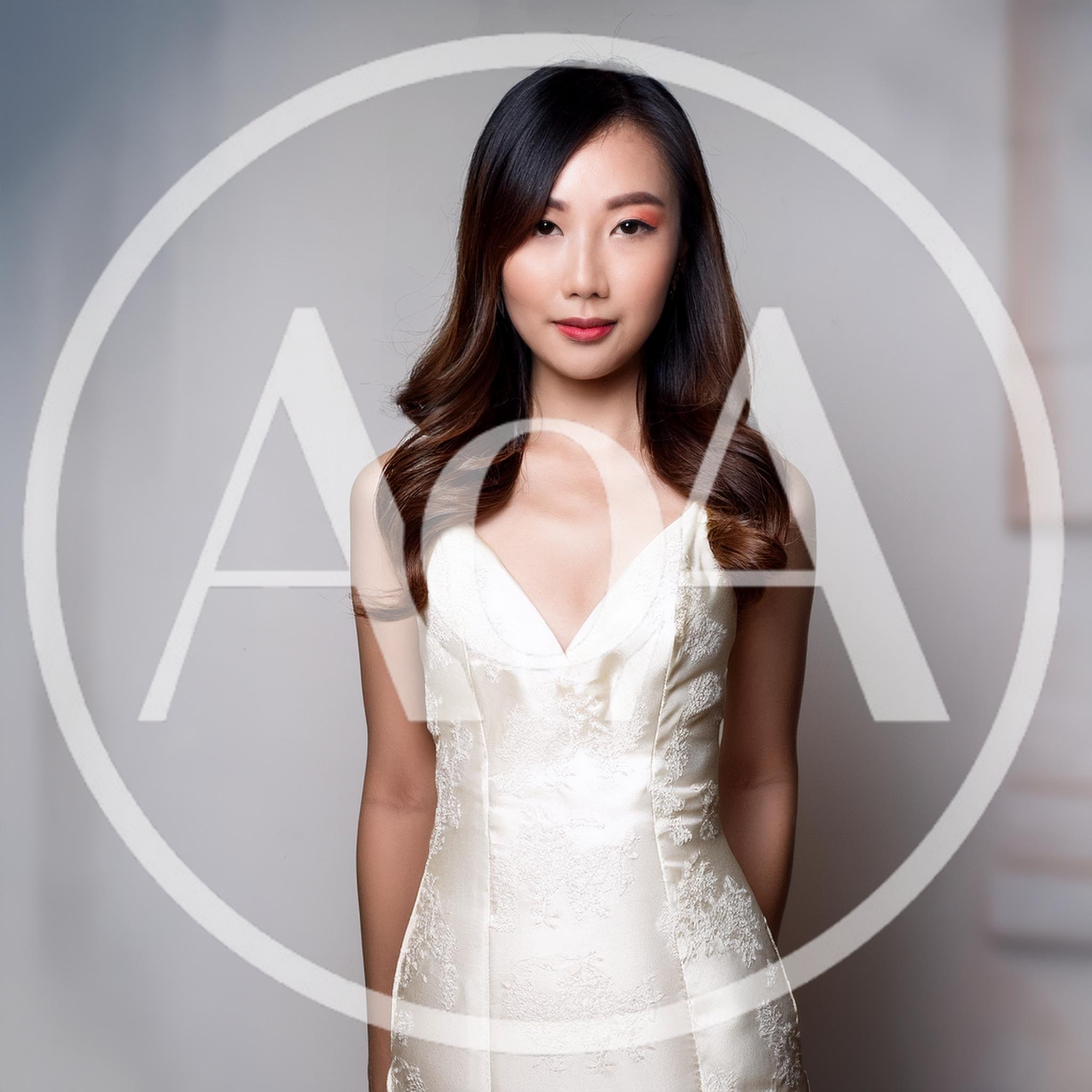 Portrait Of A Young Asian Woman In A Wedding Dress