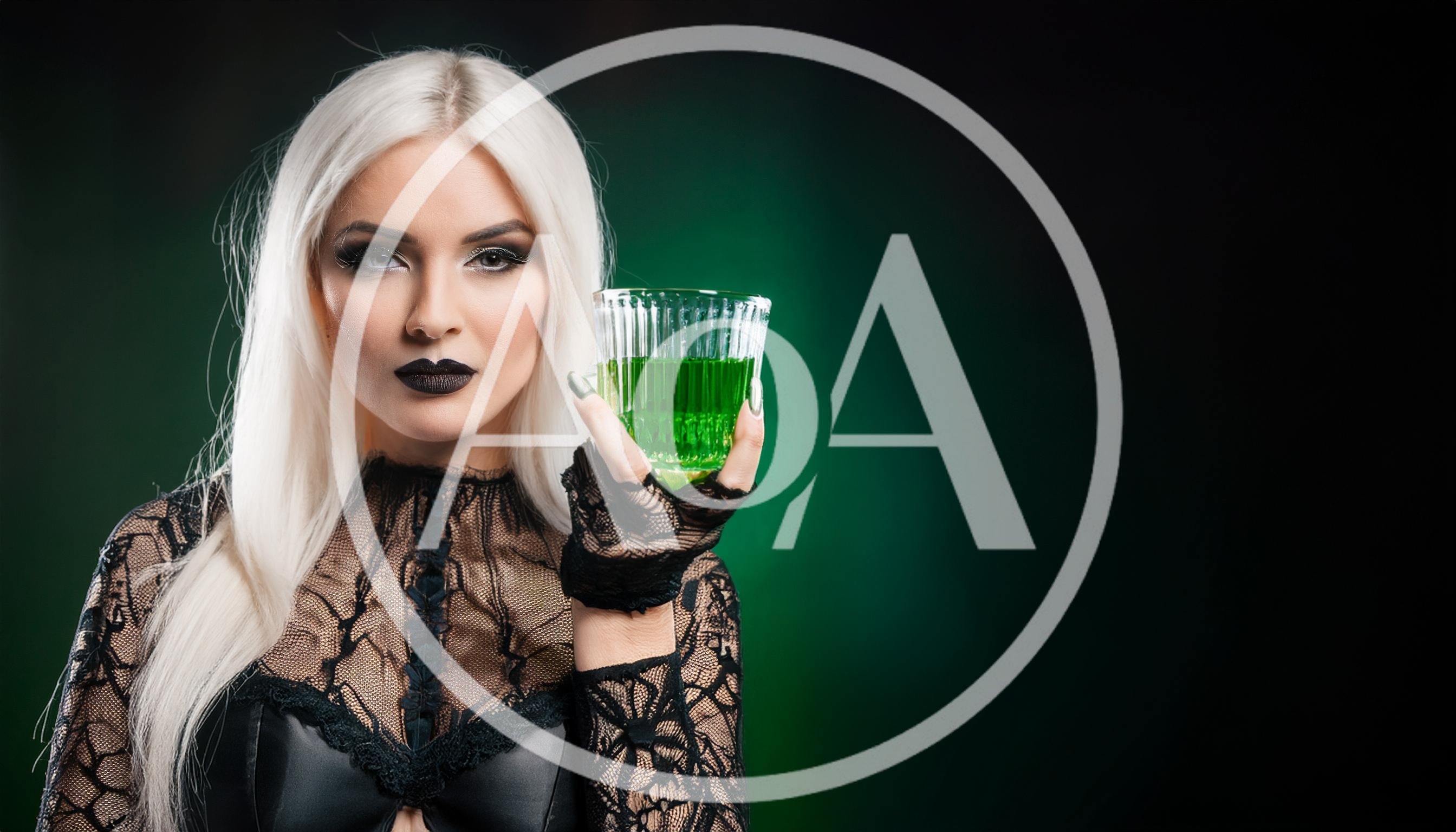 Gothic Woman Holding A Glass Of Green Potion