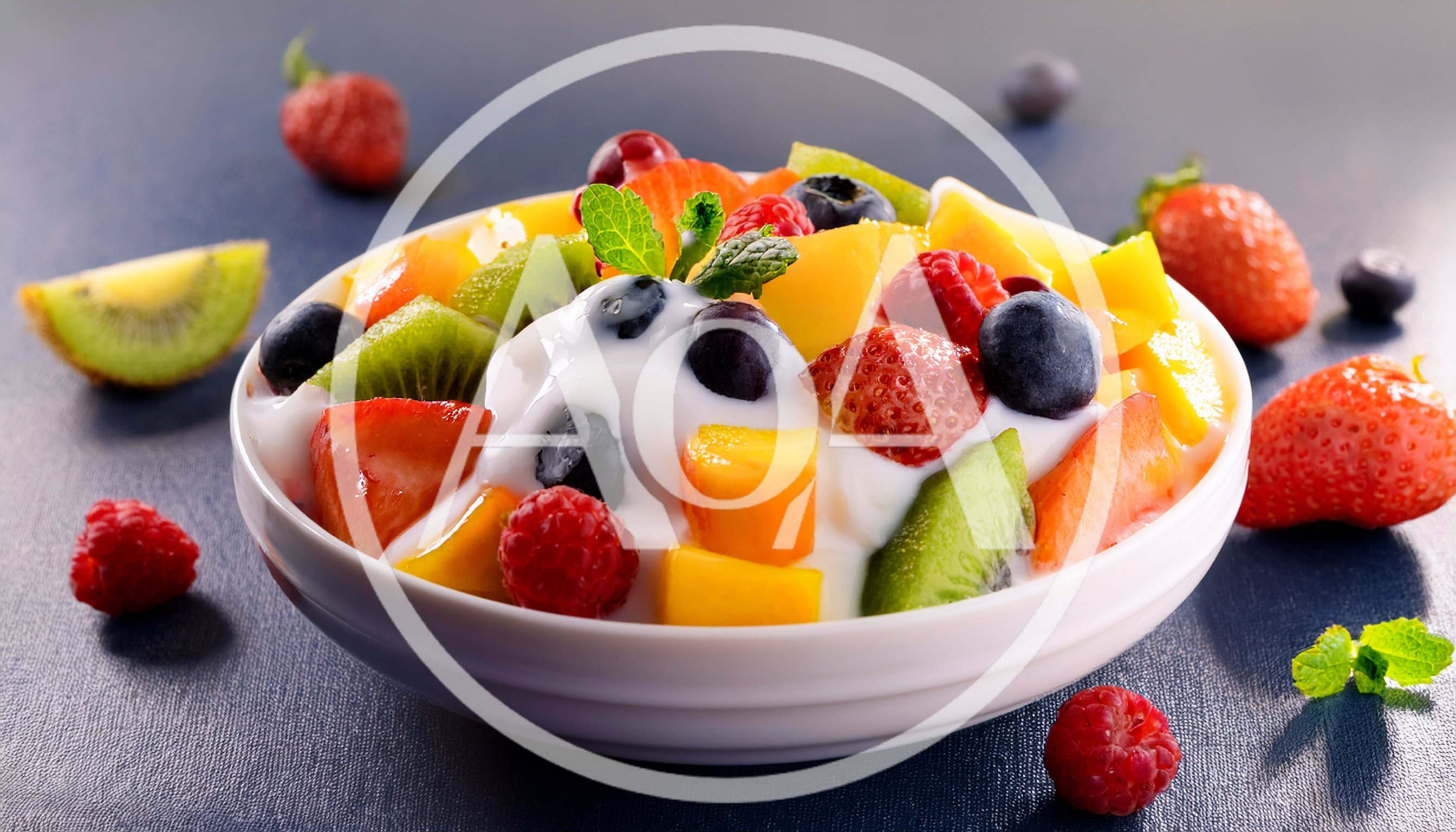 Fresh Fruit Salad Bowl With Yogurt And Mint