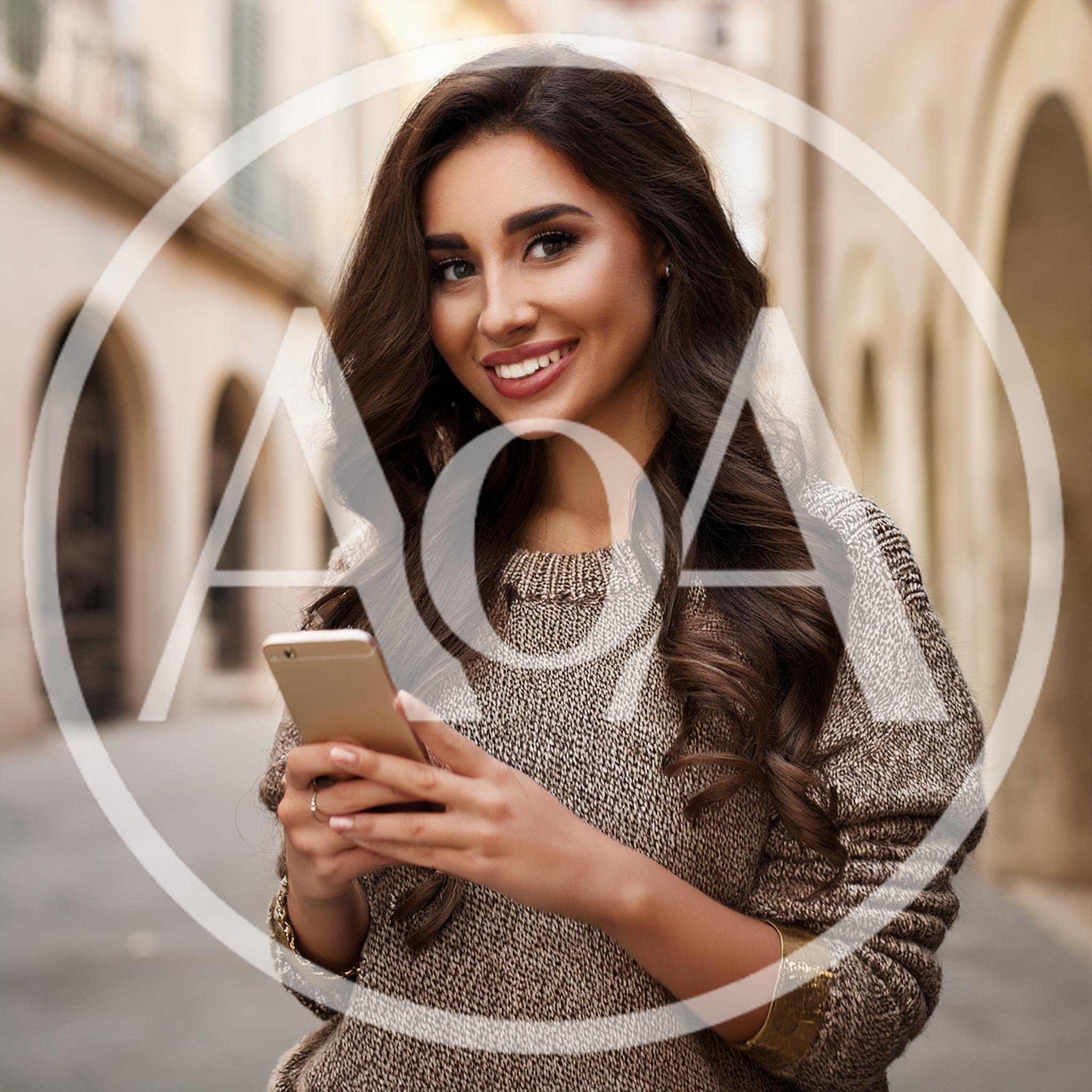 Young Woman Using Smartphone In European City Street