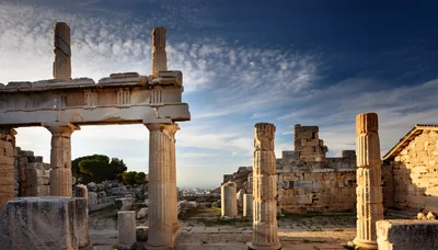 Ancient Greek Temple Ruins At Sunset