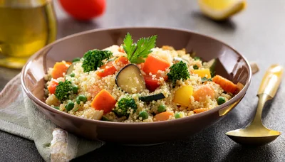 Bowl Of Fresh Vegetable Couscous With Herbs