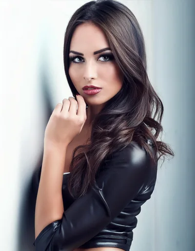 Portrait Of A Beautiful Woman In Leather Jacket
