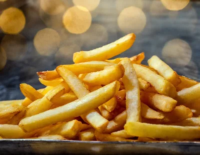 Golden Crispy French Fries On A Metal Tray
