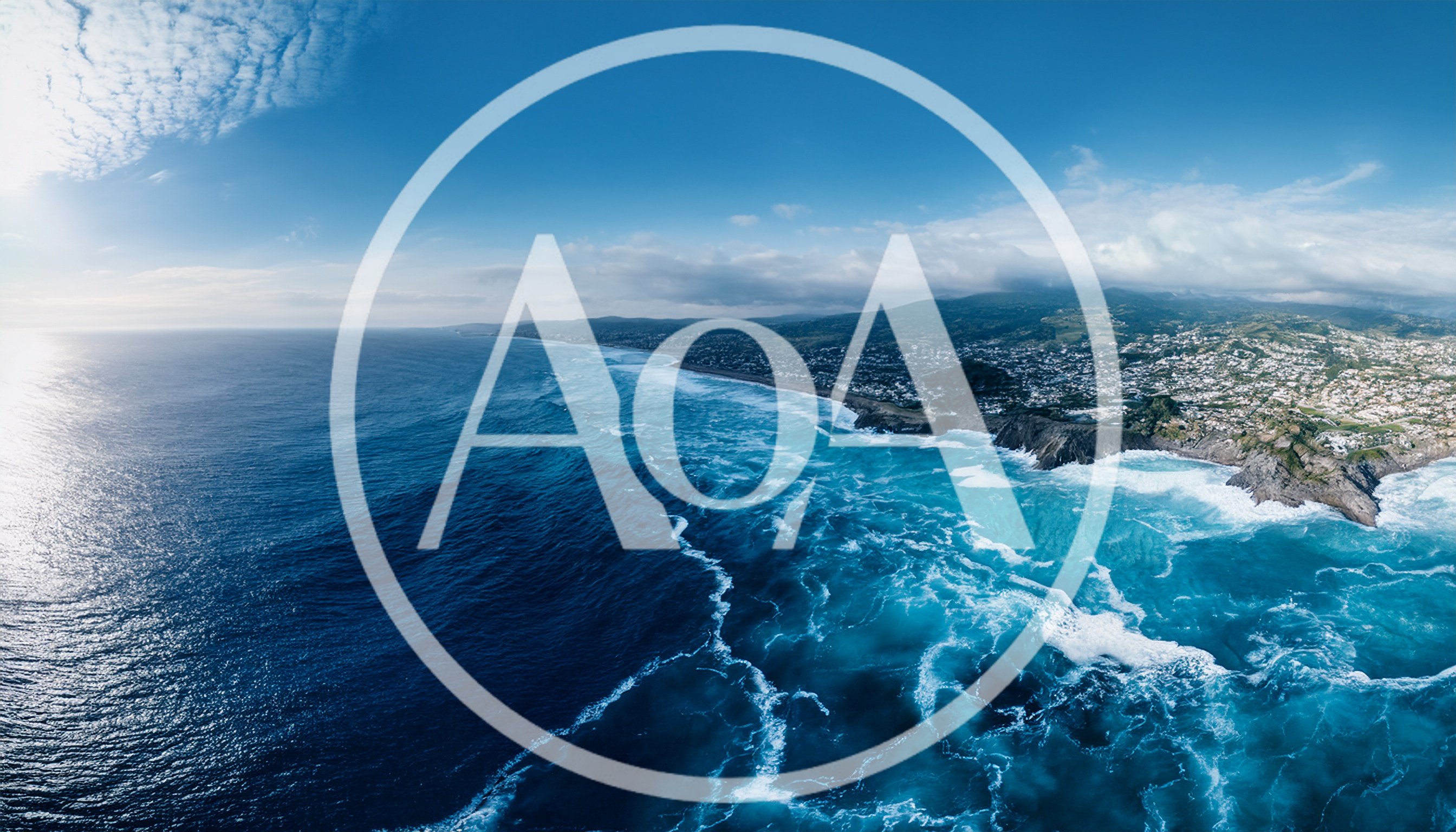 Aerial View Of Coastal Town And Ocean Waves