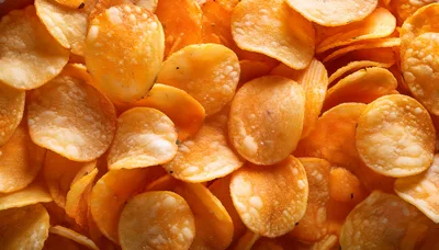 Close Up Of Crispy Orange Potato Chips