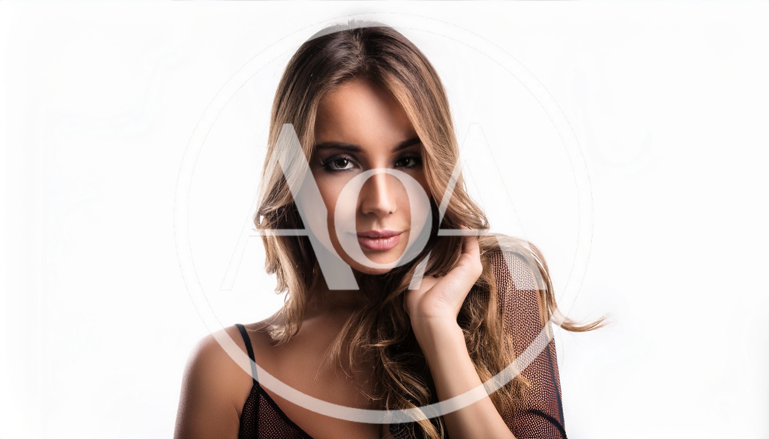 Portrait Of A Beautiful Young Woman With Long Hair