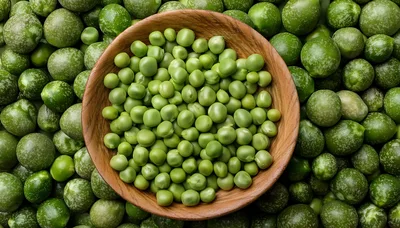 Fresh Green Peas in a Wooden Bowl