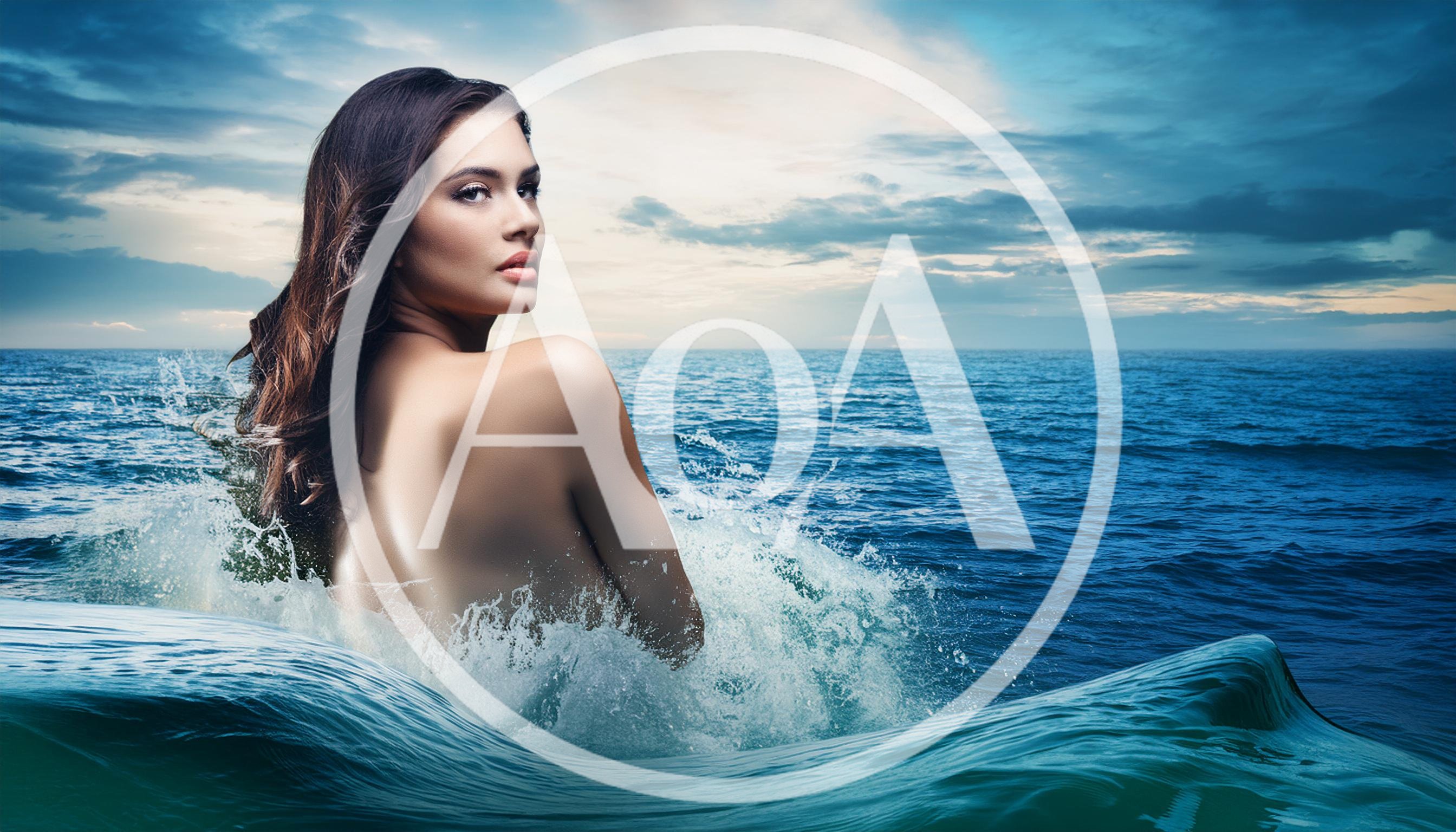Beautiful Woman Emerging From Ocean Waves