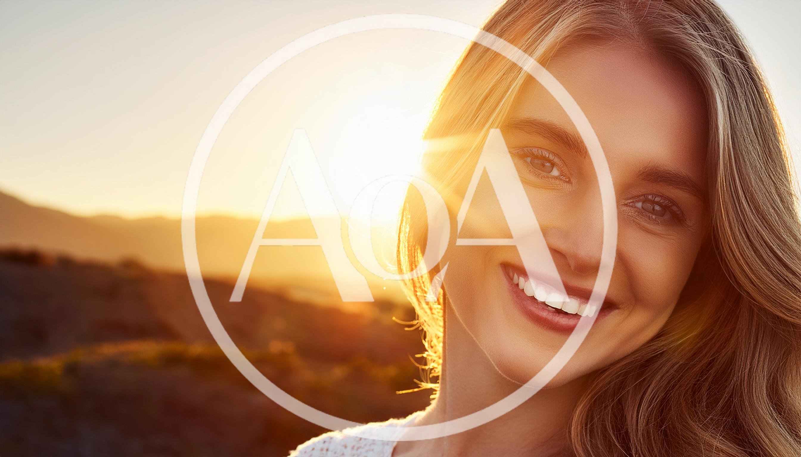 Smiling Young Woman Enjoying Golden Hour Sunset