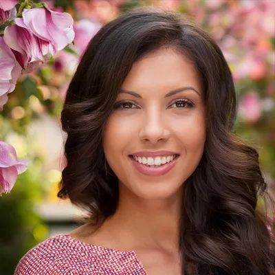 Portrait Of A Smiling Woman Outdoors