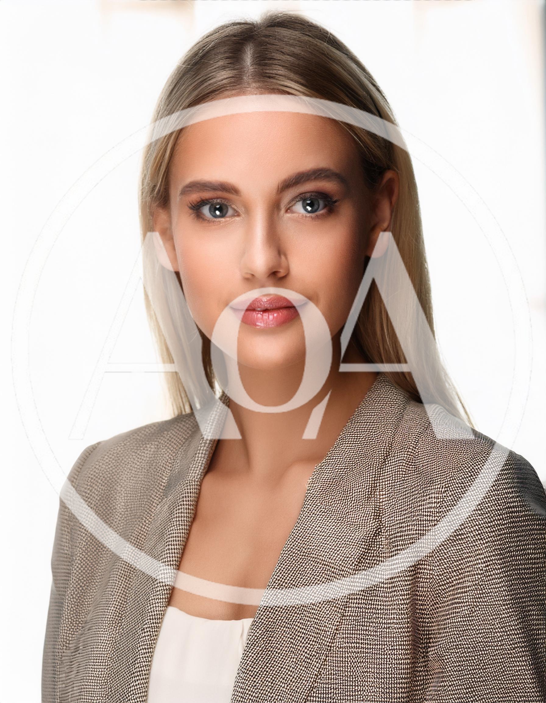 Professional Portrait Of A Young Blonde Businesswoman