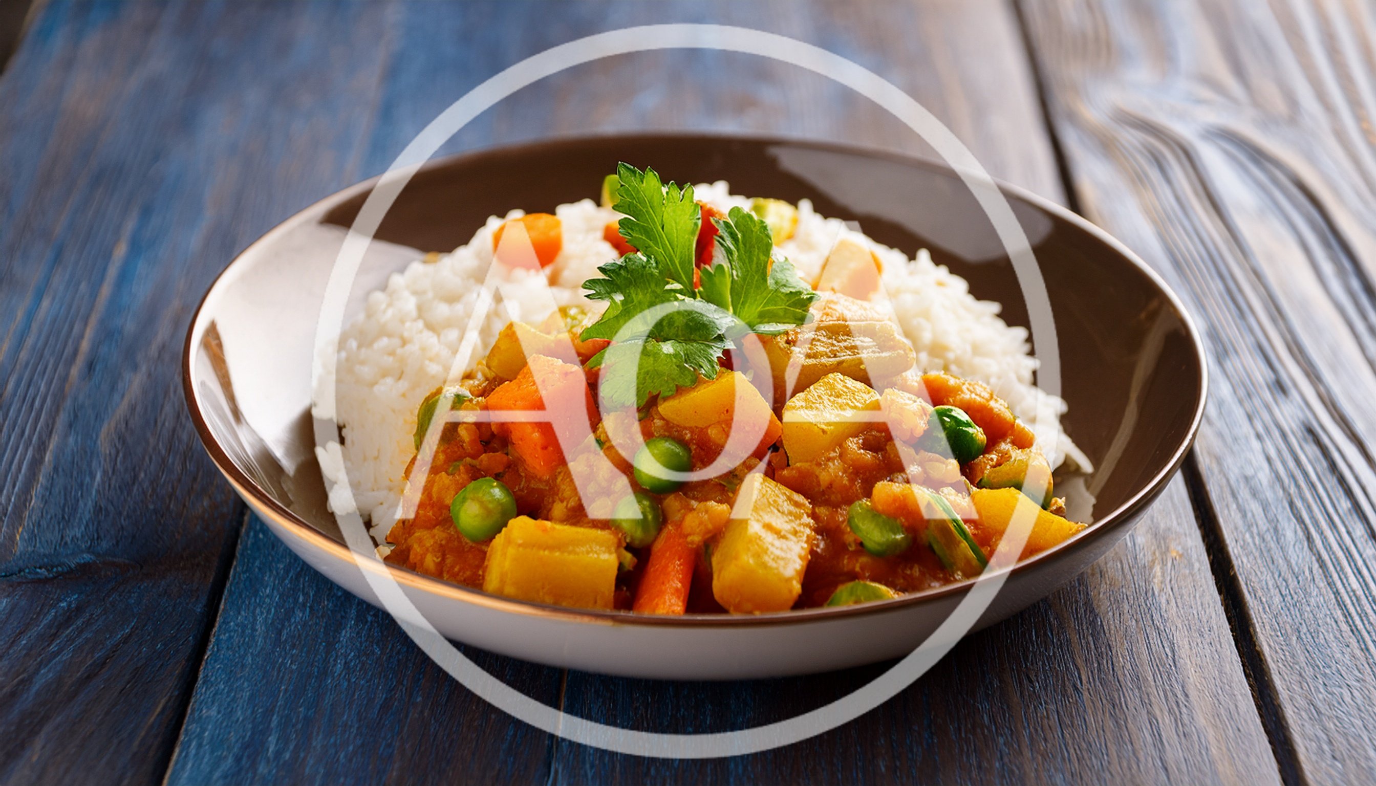 Vegetable Curry With Steamed Rice In A Bowl