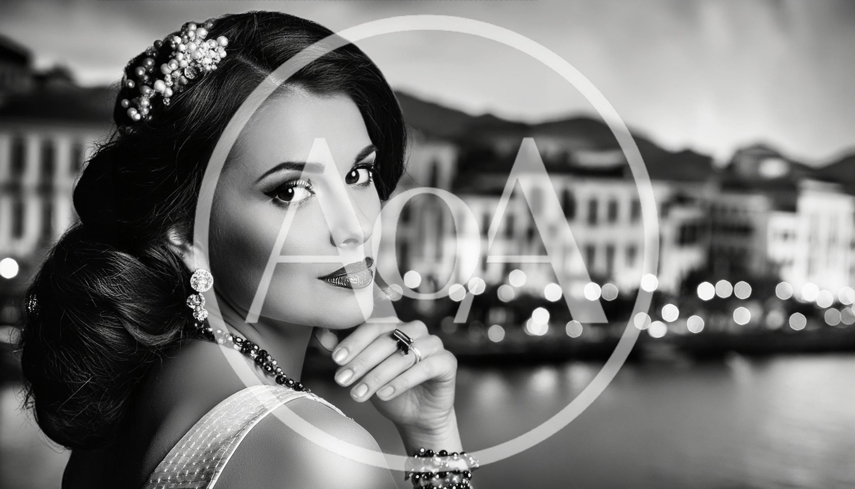Elegant Woman With Pearl Jewelry Looking Over Shoulder
