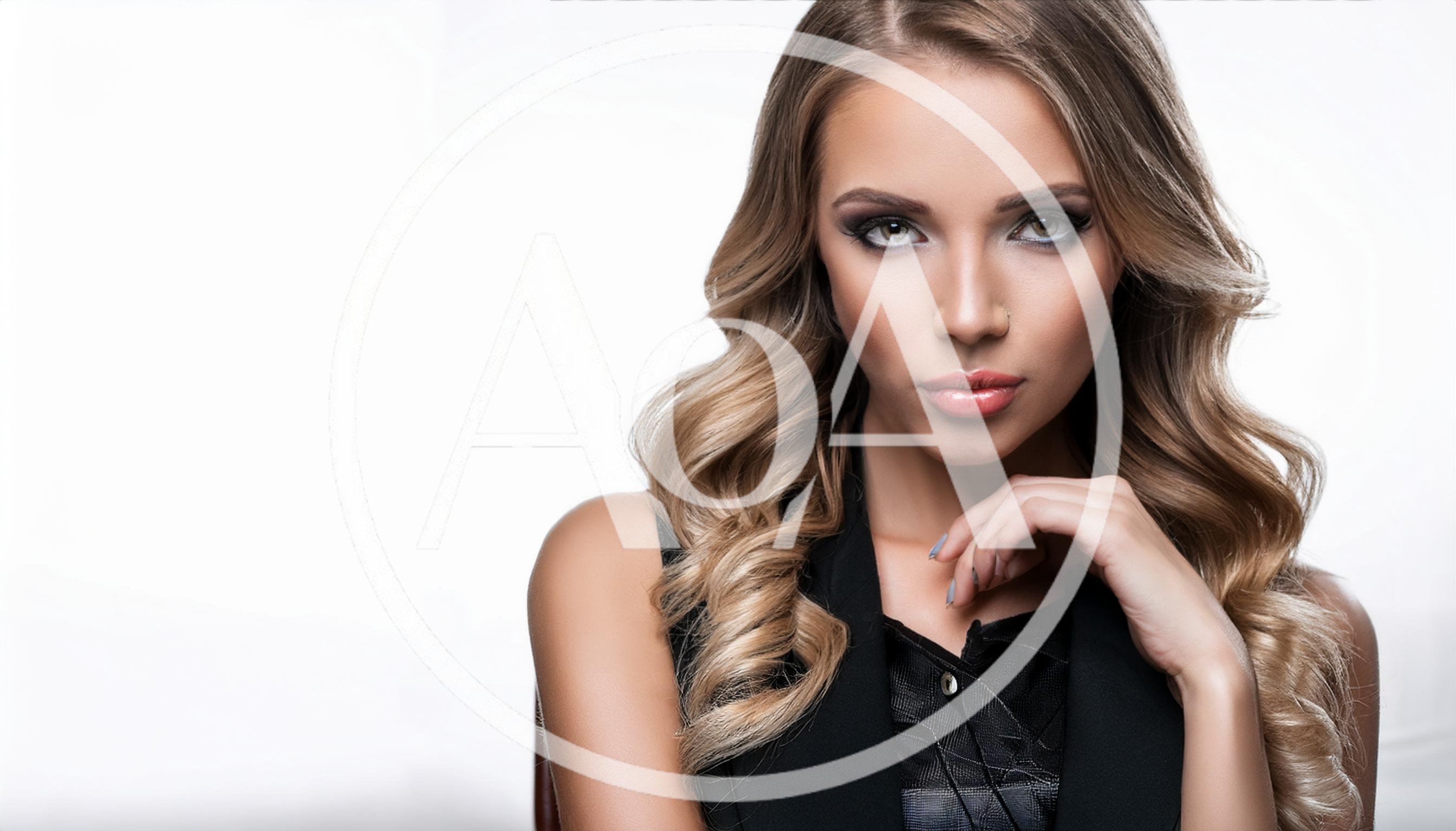 Portrait Of A Beautiful Young Woman With Wavy Hair