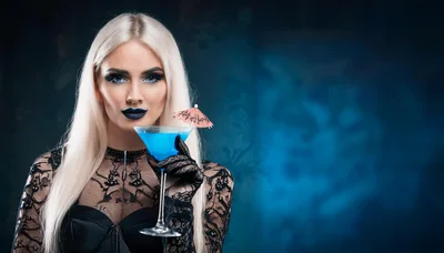 Gothic Woman Holding A Blue Cocktail