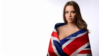 Young Woman Wrapped In A British Union Jack Flag