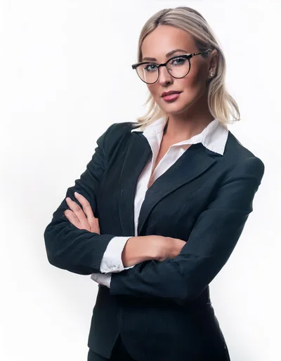 Professional Businesswoman Standing With Arms Crossed