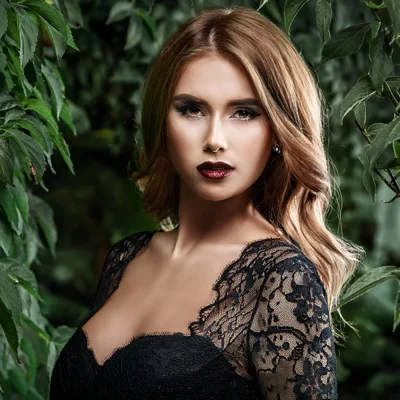 Portrait Of A Beautiful Woman In A Lace Dress